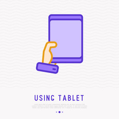 Using of tablet, gadget in hand thin line icon. Modern vector illustration.