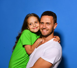 Father and child with smiling faces. Dad and daughter