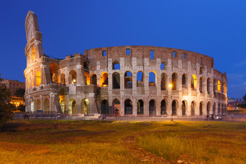 Fototapeta na wymiar Colosseum or Coliseum during blue hour, also known as the Flavian Amphitheatre, the largest amphitheatre ever built, in the centre of the old city of Rome, Italy.
