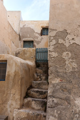 Stairs and door in the old traditional village of Emporio, Santorini, Greece