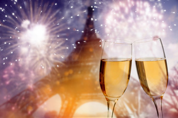 Champagne glasses on sparkling background