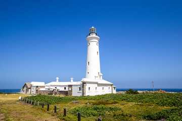 Fototapeta na wymiar Stunning view of Seal Point Lighthouse in Cape St Francis, Eastern Cape Province, South Africa. The lighthouse has been operational since 1878 and houses a museum.
