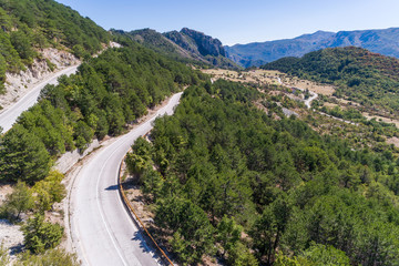 Fototapeta na wymiar Road in the mountains of Bosnia and hercegovina, aerial view.