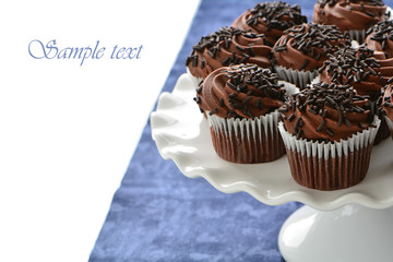 Chocolate cupcakes on cake stand