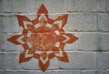 Drawing spray can on a white wall