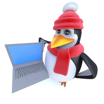 3d Funny cartoon penguin dressed for winter and holding a laptop pc