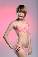 Obraz premium Beautiful sexy woman in pink underwear