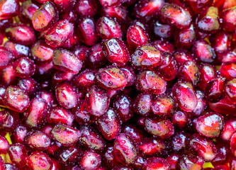 Grains of pomegranate with water drops 2