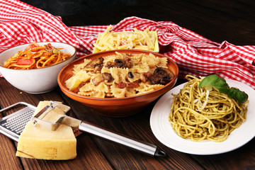 Italian pasta selection with pesto, carbonara, tomato spaghetti fresh vegetables cuisine