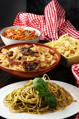 Italian pasta selection with pesto, carbonara, tomato spaghetti fresh vegetables cuisine