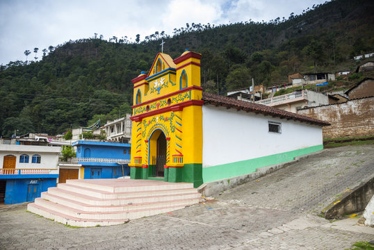 Colour facade of the church in the San Andres Xecul in Guatemala, Central America