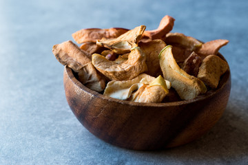 Dried Apples in wooden bowl.