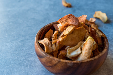 Dried Apples in wooden bowl.