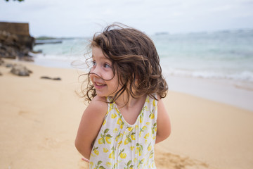 Child Playing on Beach in Oahu Hawaii