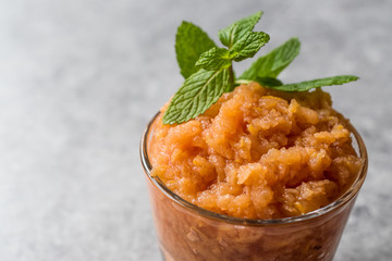 Homemade Italian Mandarin Granita Ice Cream with Mint.