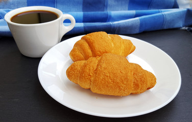  Fresh croissants and coffee for breakfast