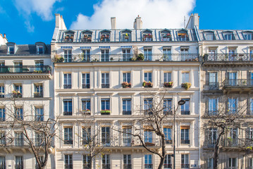 Paris, beautiful building facade in a attractive area of the capital, in the center
