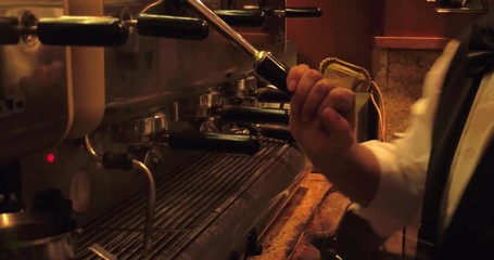 NAPLES, ITALY – JULY 2016 : Video shot of barista making coffee in local coffee shop