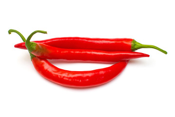 Red chili peppers isolated on white background. Creative spicy sharp. Flat lay, top view