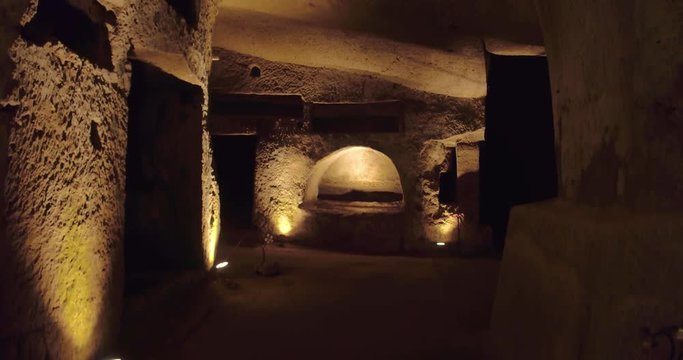 NAPLES, ITALY &ndash; JULY 2016 : Video shot in Catacombe di Napoli / Naples Catacombs with lights and carvings in view