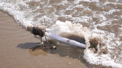 High quality video of message in the bottle in the water in real 1080p slow motion 250fps 