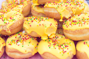 beautiful donuts on a shelf