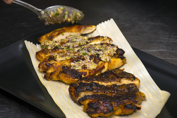 Grilled chicken assonate with homemade sauce 