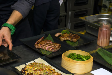 Flat beef steak cooked rare and sliced 