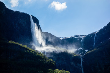 Fototapeta na wymiar Waterfalls on cliffs near Sognefjord, Norway.