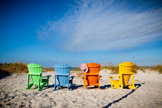 colorful Adirondack chairs in Florida