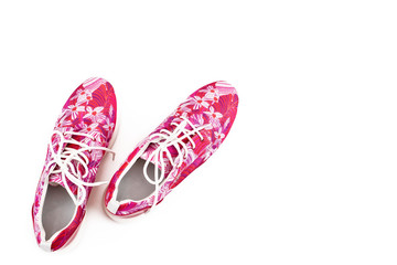 Women's fashion sneakers pink on a white background.
