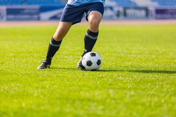Closeup of a Soccer Player Legs in Action