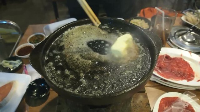 00:02 | 00:18
1×

Cube of butter melting in hot pan. Preparation for cooking in Thai barbecue buffet restaurant.
