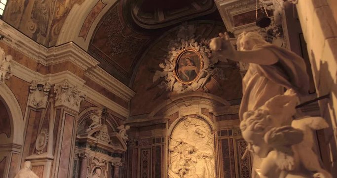 NAPLES, ITALY – JULY 2016 : Video shot of Cappella Sansevero chapel interior on a sunny day with statues and paintings in view