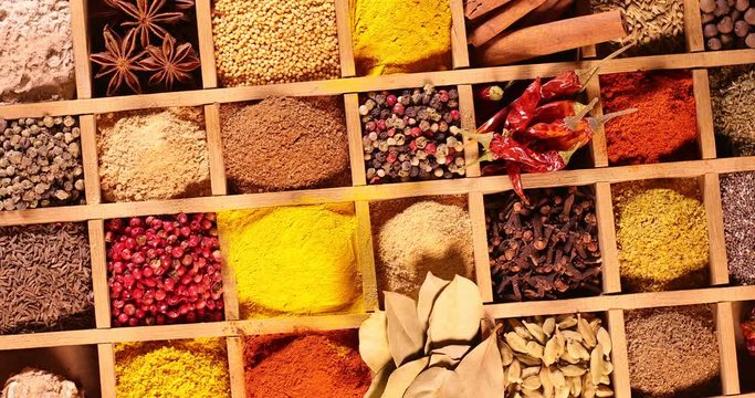 Wooden box with spices and herbs