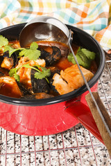 freshley cooked seafood pot with fish and mussel