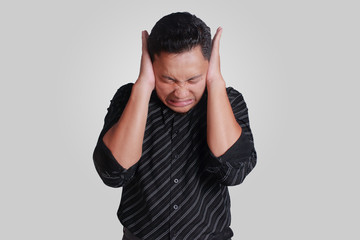 Young Man Close His Ears