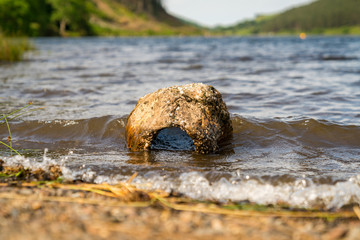 Fototapeta na wymiar A stone washed out from Llyn Geirionydd near Llanwrst, Conwy, Wales, UK