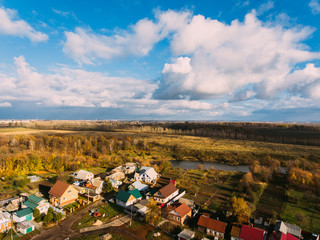 Golden red sunlight AERIAL view, Russia, River, small town, bridge