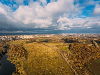 Golden red sunlight AERIAL view, Russia, River, small town, bridge