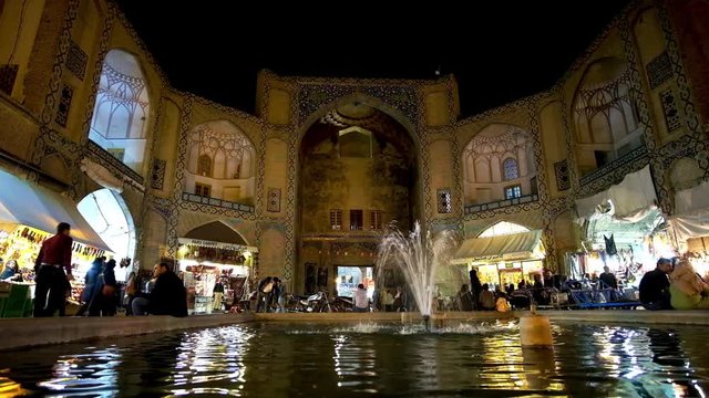 The fountain in front of the main entrance to the Grand Bazaar (Qeysarriyeh), located in Naqsh-e Jahan (Royal) Square,  Isfahan.