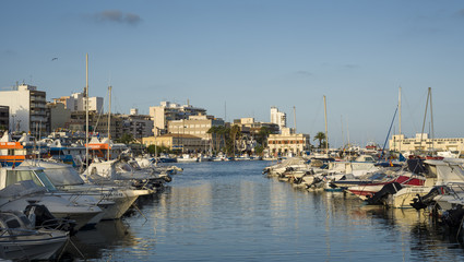 Fototapeta na wymiar Motorboats and sailboats in the sport port of Santa Pola, Alicante, Spain, on July 18, 2016