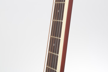 Close up of fret board, diagonal composition. Fret marker included in composition
