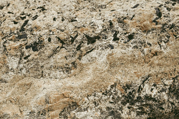 Beige granite rock background texture