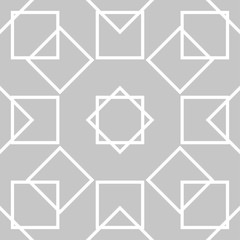 Gray and white geometric ornament. Seamless pattern