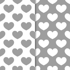 Gray and white hearts as seamless patterns. Set of romantic backgrounds