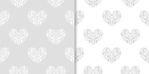 Gray and white hearts as seamless patterns. Set of romantic backgrounds