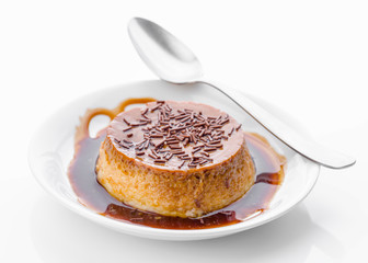 chocolate flan isolated on white