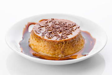chocolate flan isolated on white