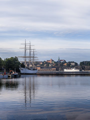 Stockholm daylight skyline panorama with stationary tall ship hotel